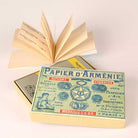 Vintage gift box set of Tradition incense paper booklets from Papier d'Armenie on light background