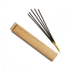 Incense sticks with a cardboard packaging on a white background