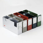 Set of colorful large steel tape dispensers in a row on a white background
