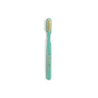 Green striped toothbrush on white background
