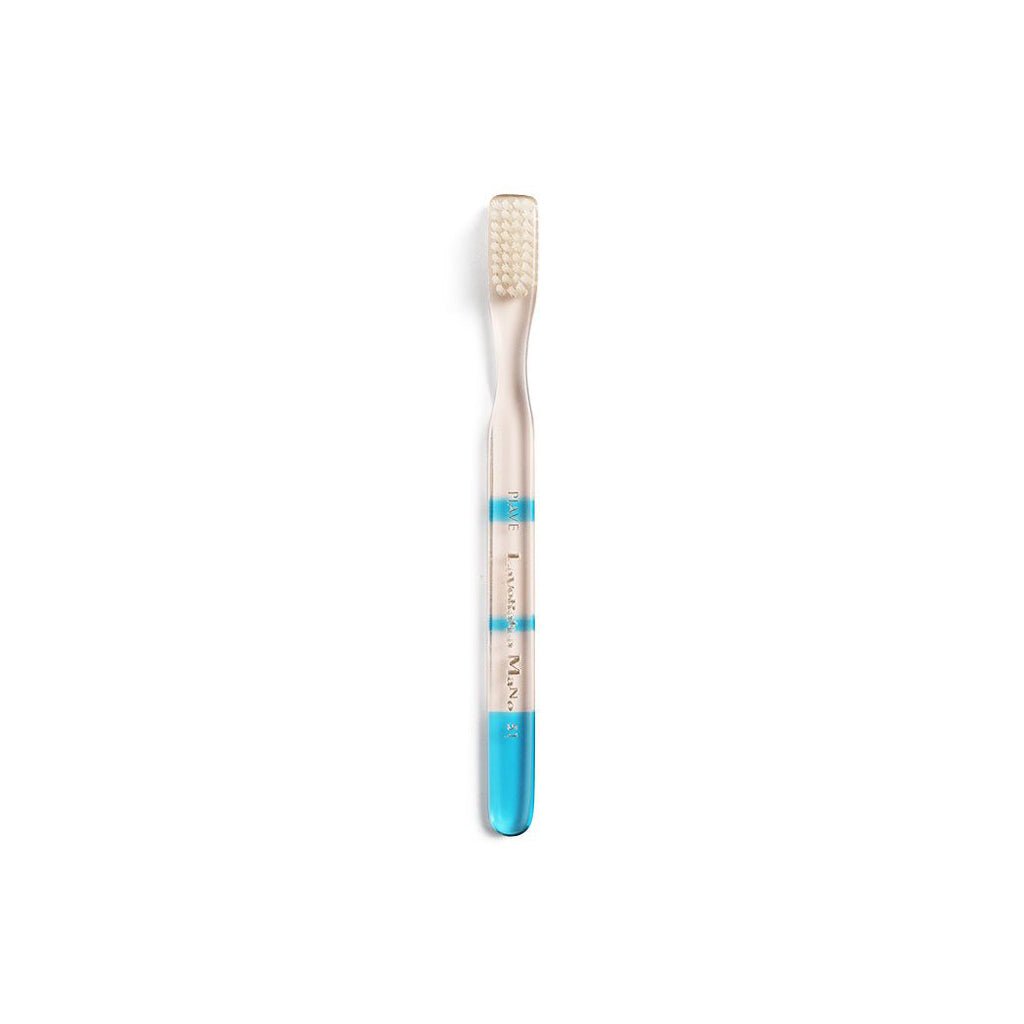 Blue and clear toothbrush with gradient color handle on a white background