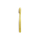 Yellow and clear striped toothbrush on white background