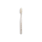 White and clear striped toothbrush on white background