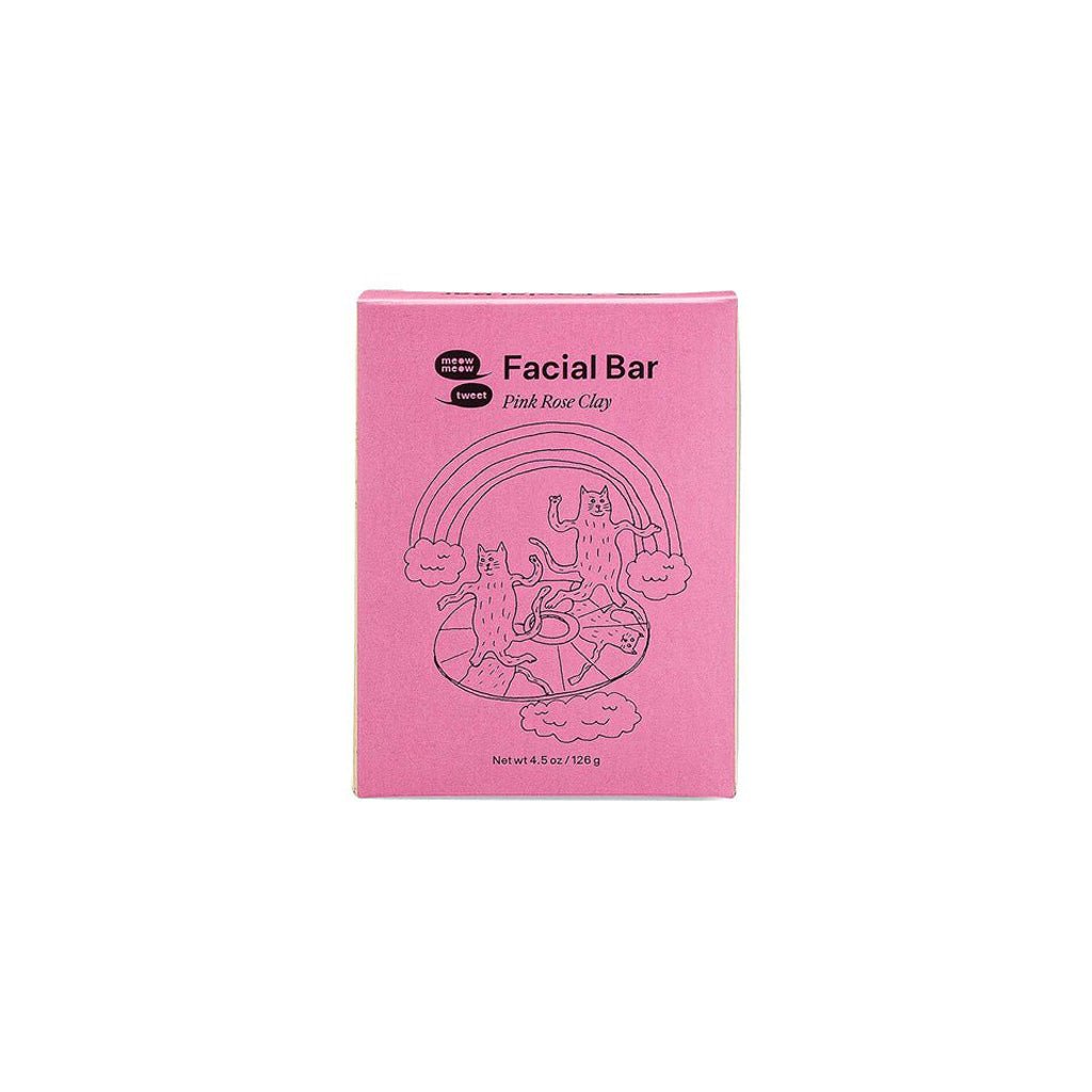 Pink packaging of a facial bar with branding on a white background