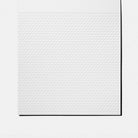 Sheet of slash gridded paper on white background