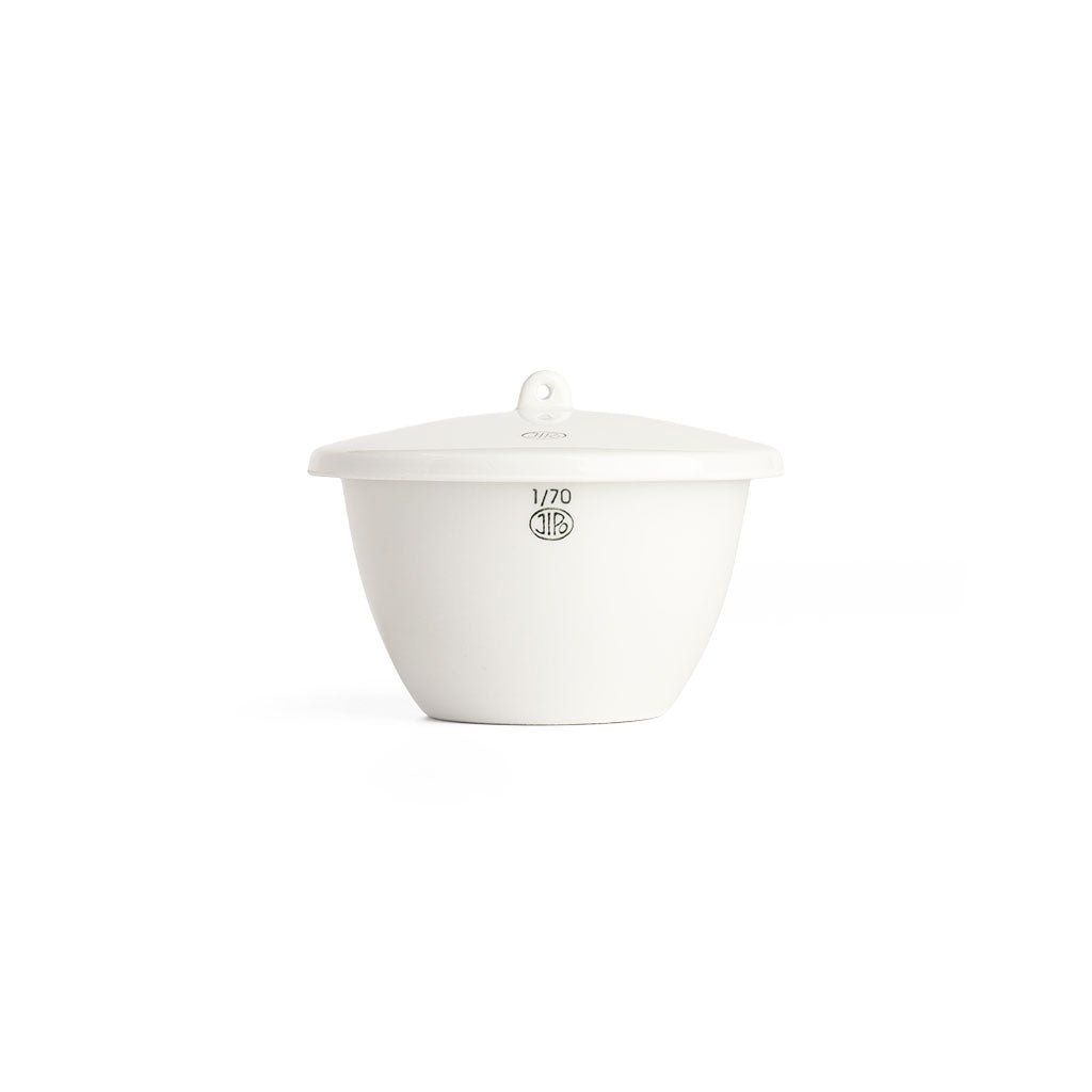 White porcelain jar with lid on white background.