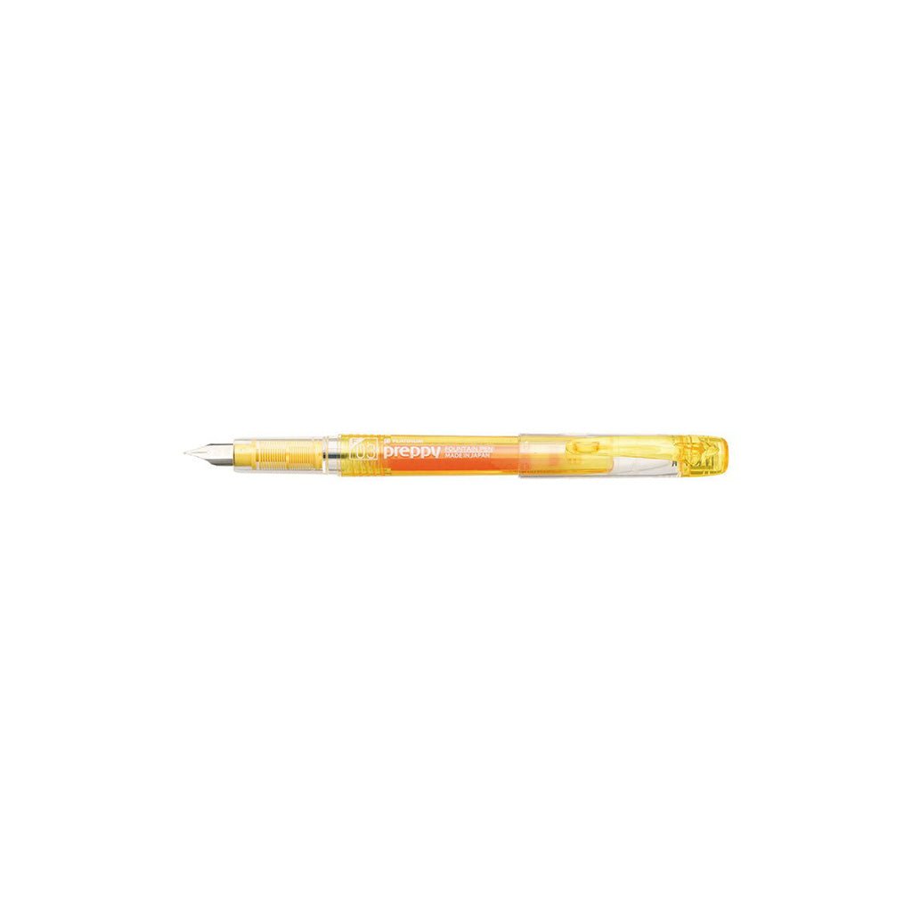 Yellow fountain pen on a white background