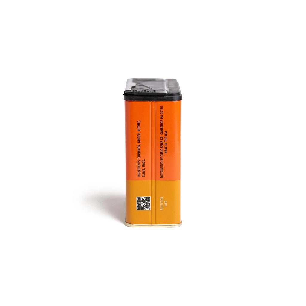 Orange tin of Curio Spice pumpkin spice everyday blend tin on white background