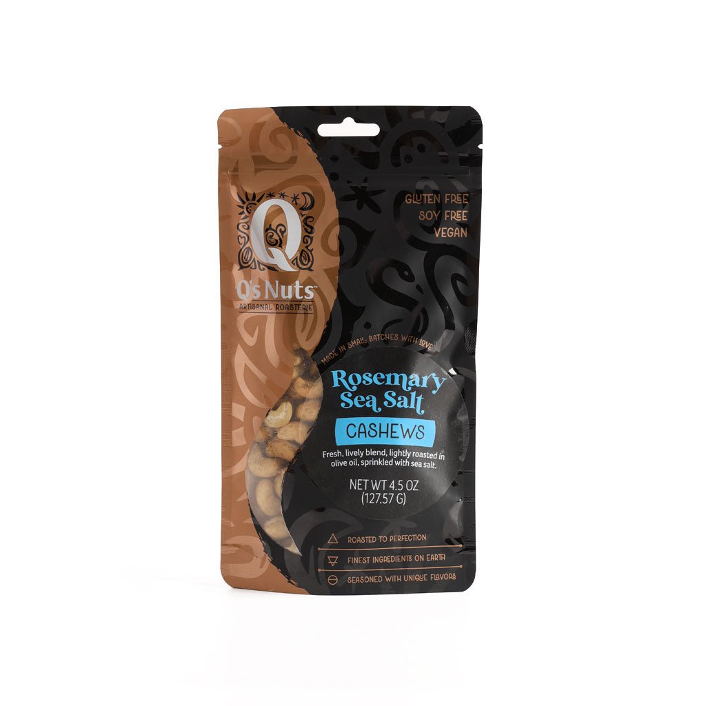 A branded bag featuring the Q's Nuts logo, labeled Rosemary Sea Salt Cashews. 