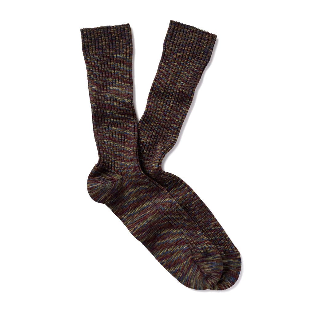 Pair of multicolored socks in deep burgundy, olive green, muted blue, brown, and subtle gold tones. 