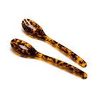 Tortoiseshell two-piece acrylic salad serving set on white background