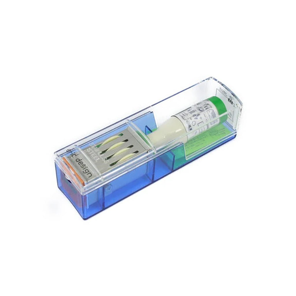 A rotary stamp shown in its packaging, which is a clear plastic case. 