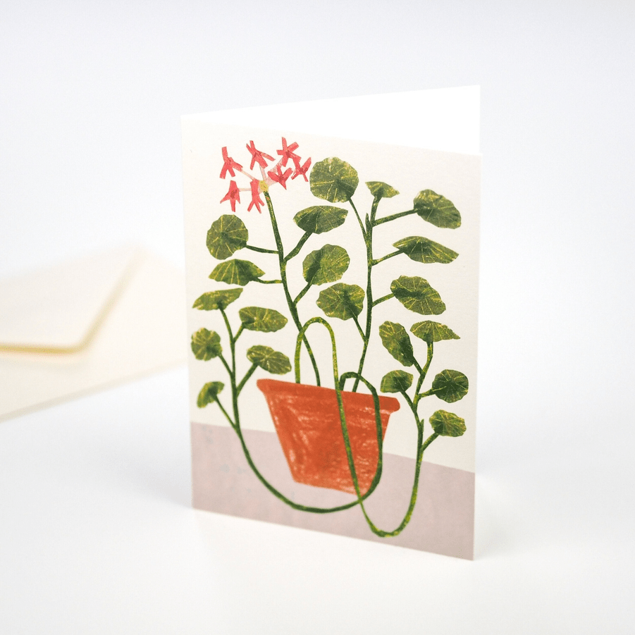 Card with a potted plant illustration on a white background
