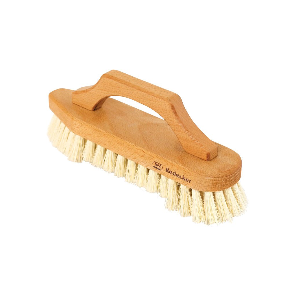 A wooden cleaning brush with a natural wood handle and cream-colored tampico bristles, shown on a plain white background.
