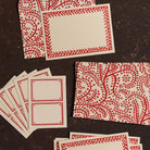 Red and white patterned cards 