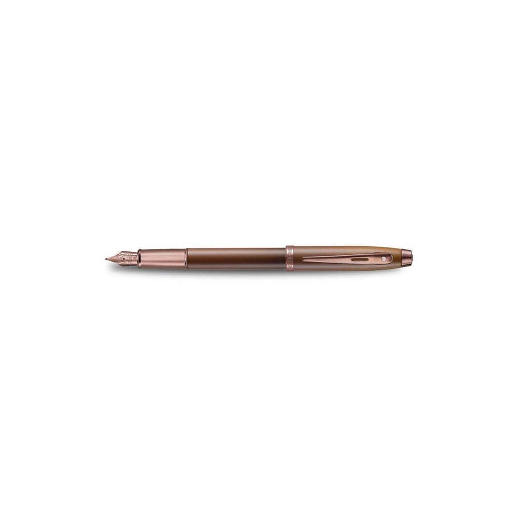 Brown rose gold pen on a white background