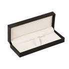 Open black pen box with white interior on a white background