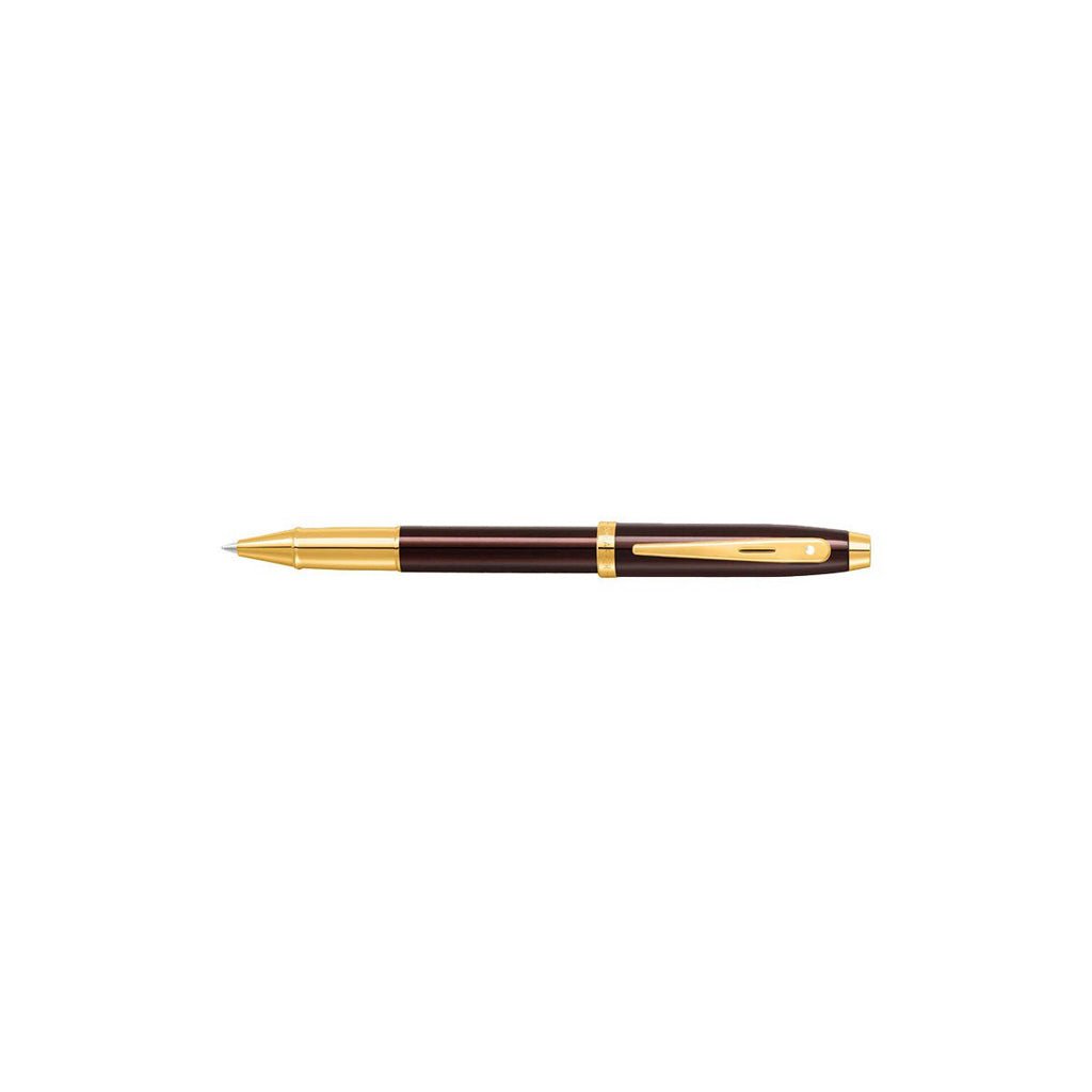 Pen with gold accents on a white background