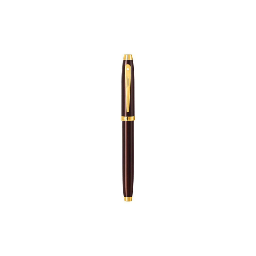 Pen with a gold clip on a white background
