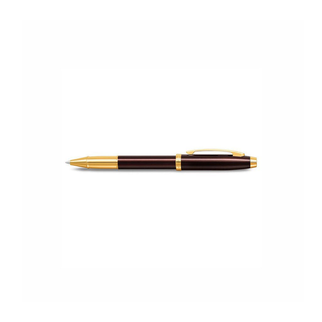 Pen with gold accents on a white background