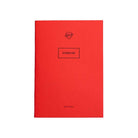 Red exercise notebook on white background