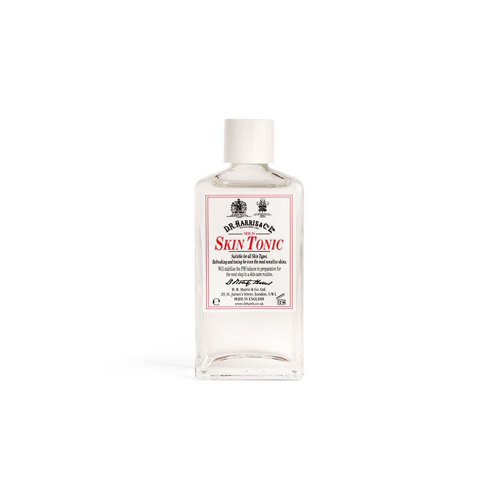 Bottle of D.R. Harris skin tonic with a label on a white background