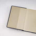 Hobonichi HON book with clear PVC cover open on light background