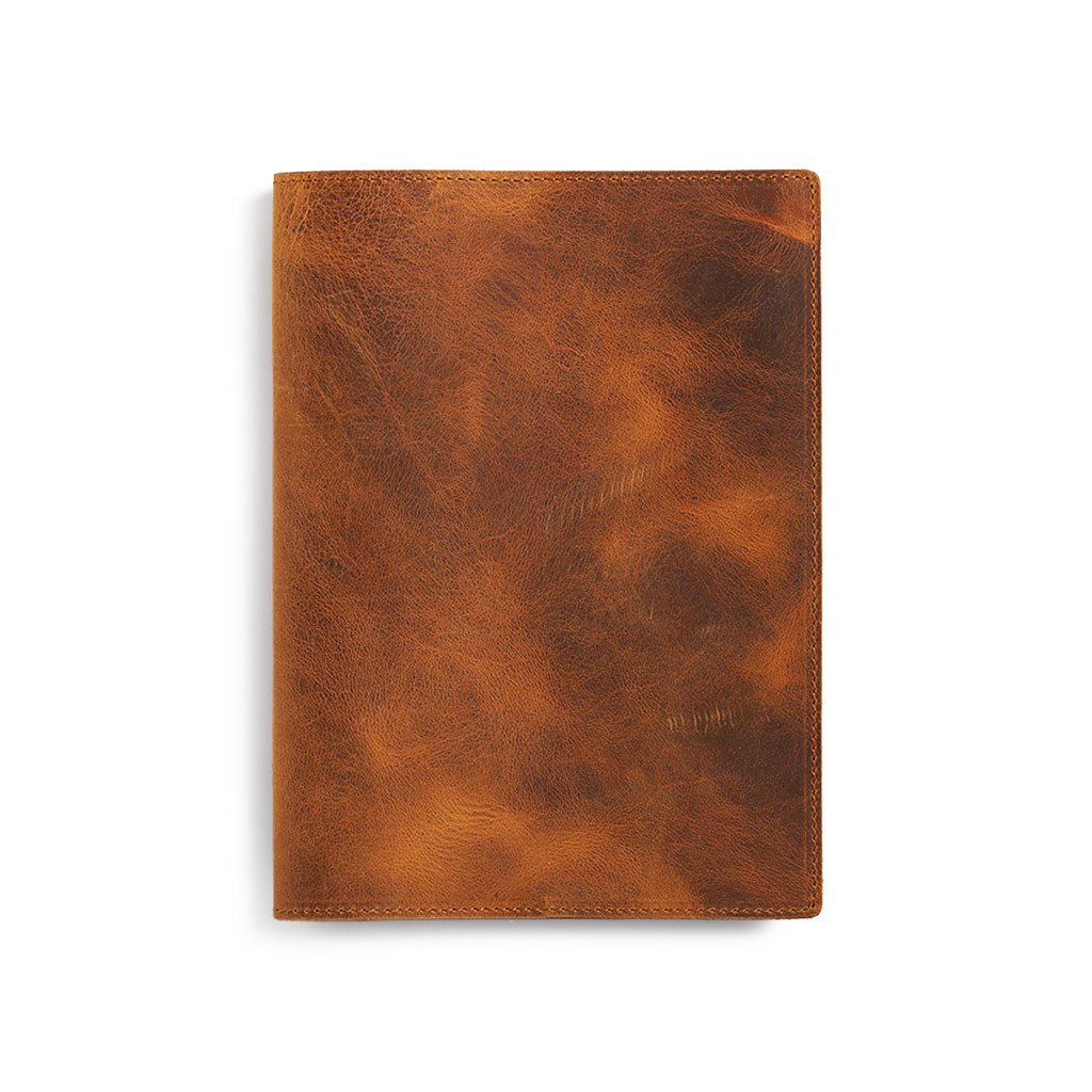 Brown A5 leather notebook cover on white background