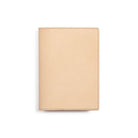 Natural undyed leather A6 notebook cover on white background
