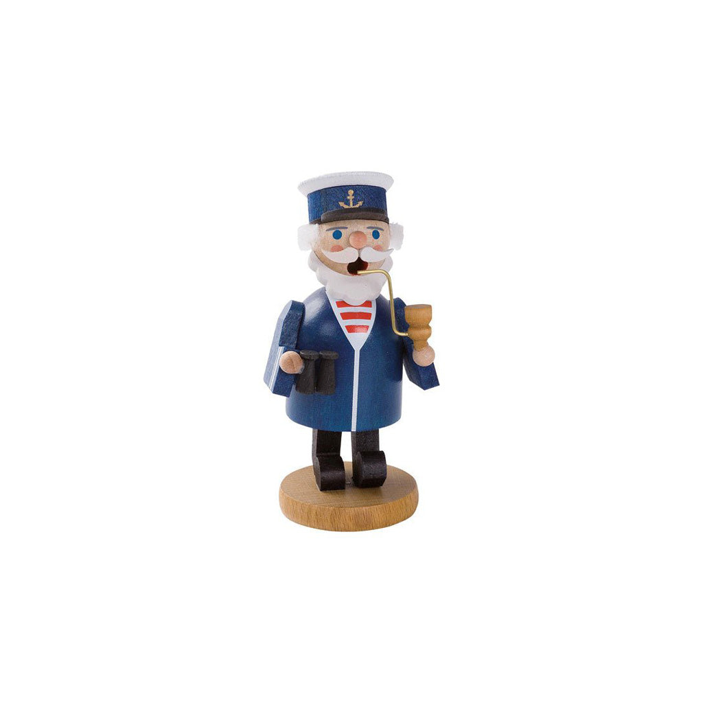 A hand-painted wooden incense burner figurine of a sea captain, wearing a blue uniform and hat with a red and white striped shirt, standing on a round wooden base against a white background.