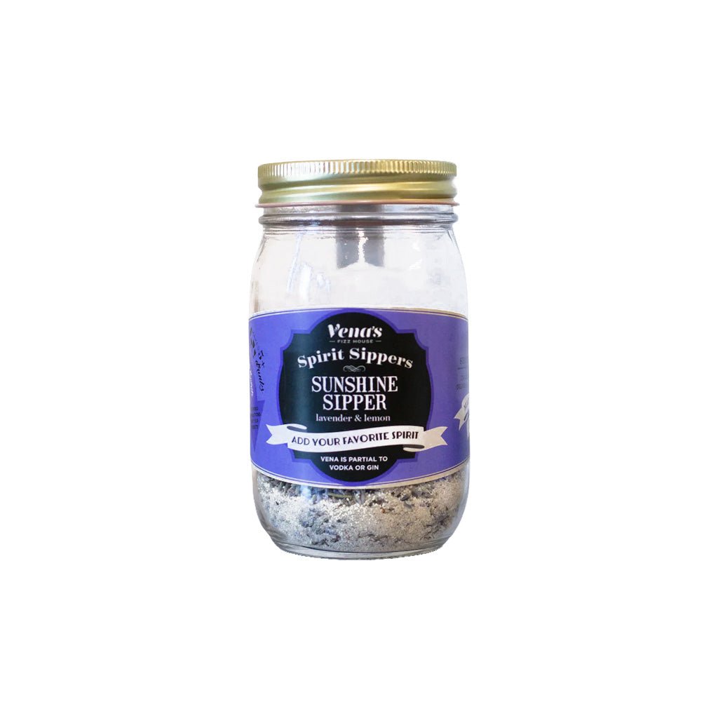 Vena's Sunshine Sipper cocktail mix in mason jar with purple label on white background