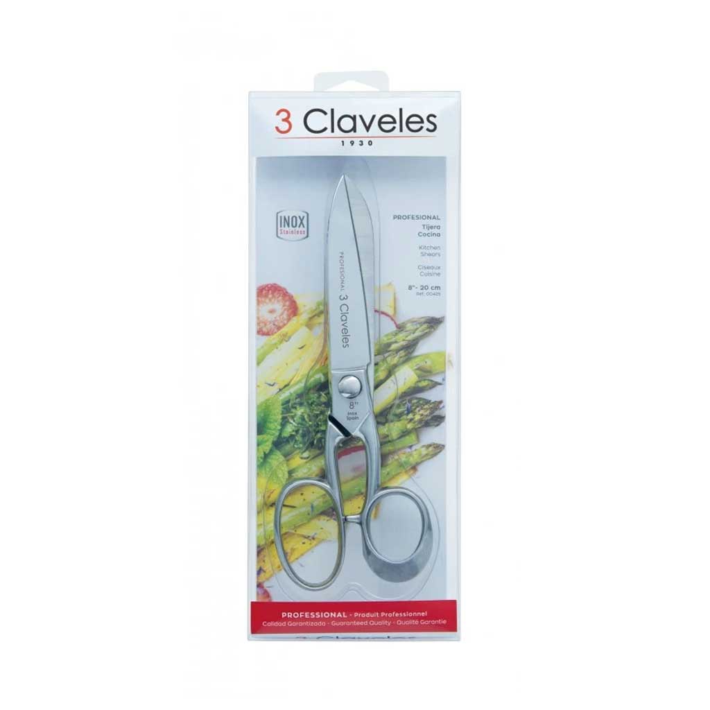 Stainless steel shears in 3 Claveles packaging on white background