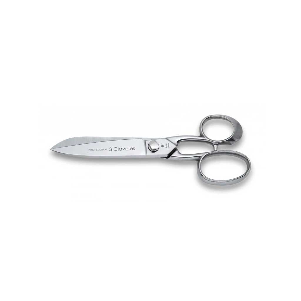 Pair of stainless steel kitchen shears on white background