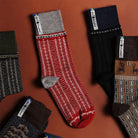 Collection of patterned socks on a brown background