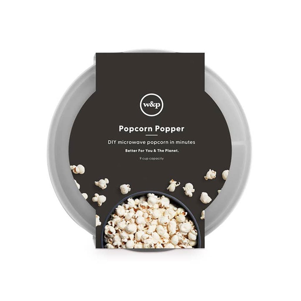 Popcorn popper with a featuring popcorn kernels on a black label. 