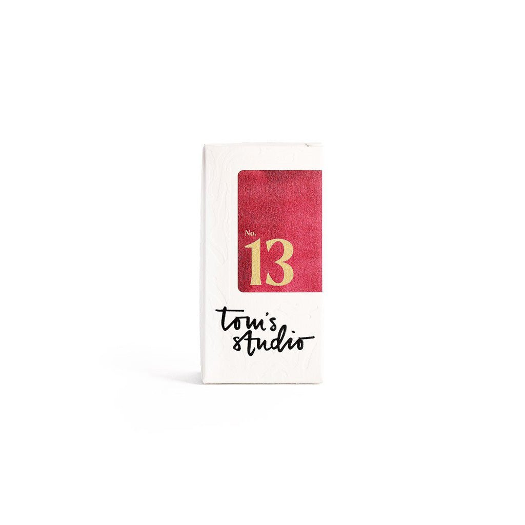 Tom's Studio 13 deep red Mulberry Ink in white box on white background