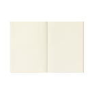 An open notebook with blank, warm cream-colored pages, shown against a solid white background.