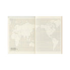 An open passport notebook refill with world map on white background.