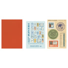 A red Traveler's Passport Notebook refill next to 2027 Diary guide on white background