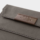 Brown zippered case against light background