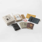 Contents of black Card-size anniversary set against light background
