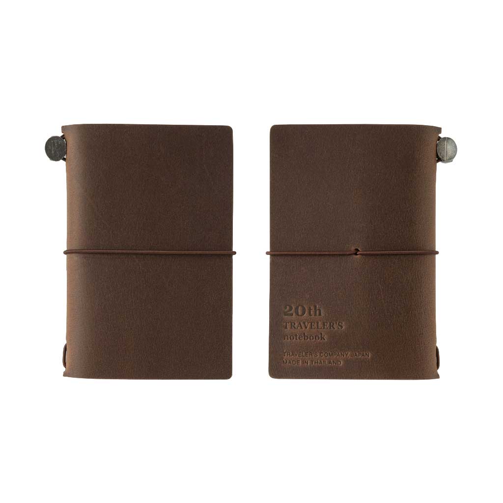 Front and back of brown 20th anniversary card-size notebook on white background