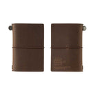 Front and back of brown 20th anniversary card-size notebook on white background