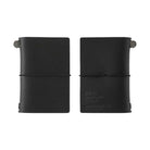 Front and back of black 20th anniversary card-size notebook on white background