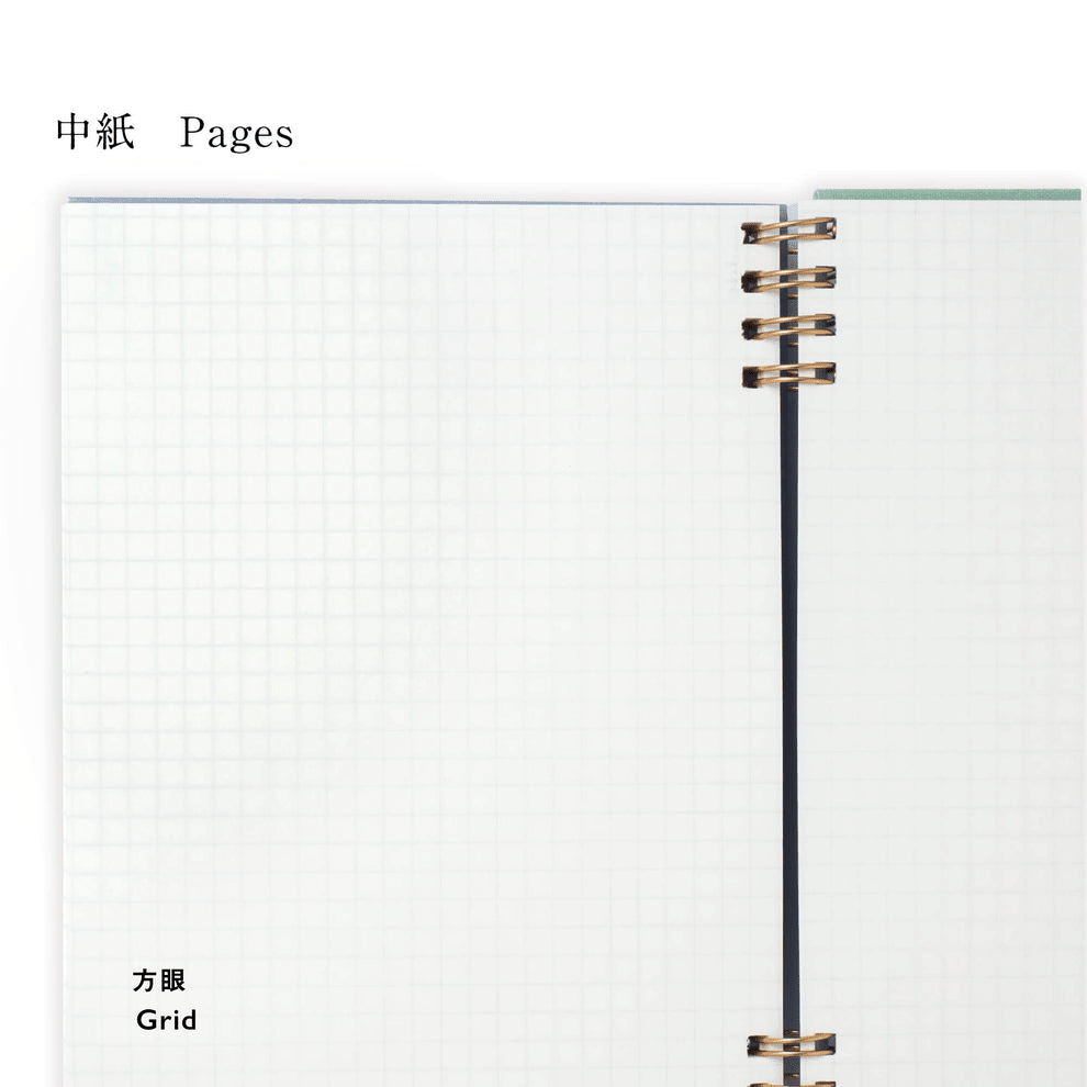 Open notebook with grid pages and spiral binding on a white background
