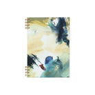 Notebook with artistic cover design on a white background