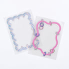 Two pastel decorative stickers with playful designs on a white background