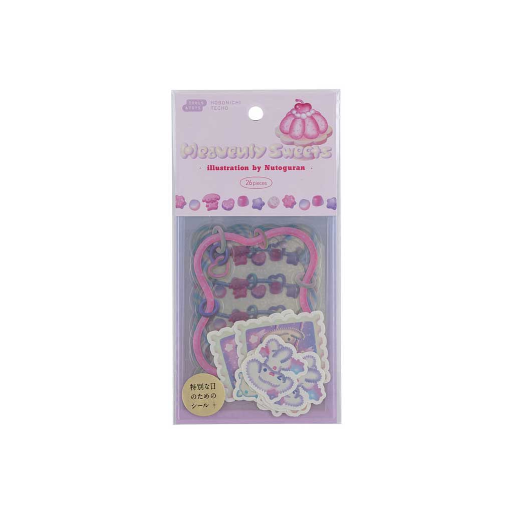 Packaged pastel pink and purple decorative stickers with illustrations on a white background