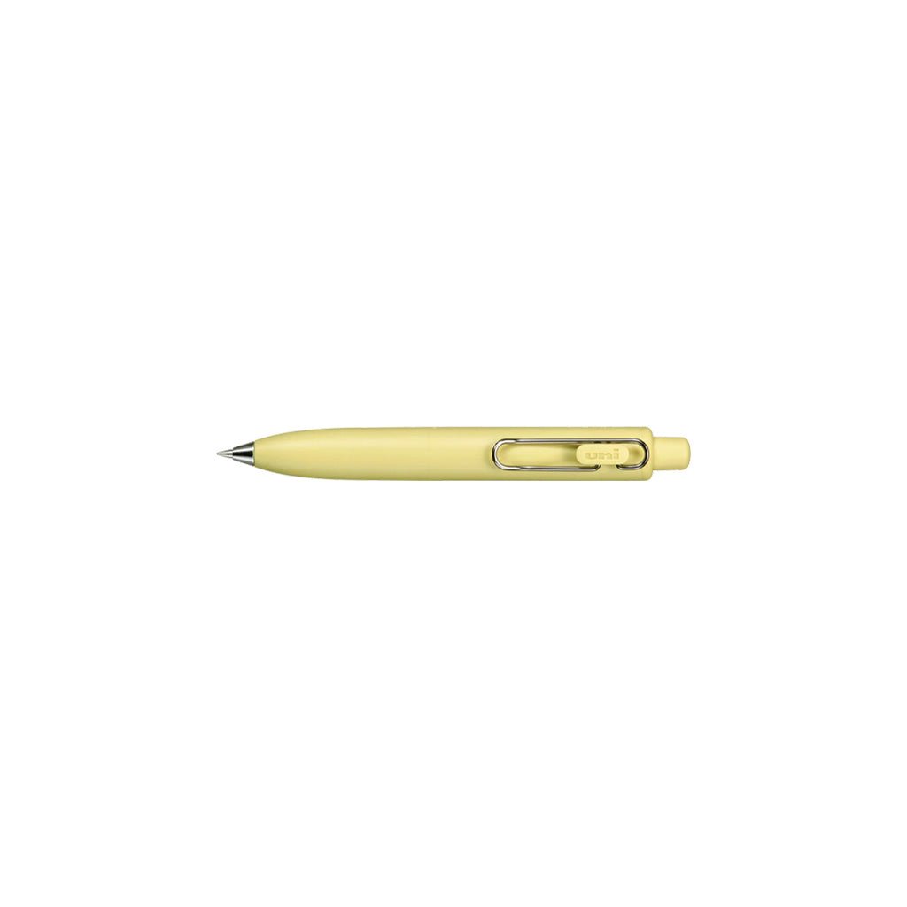 Yellow uniball one p gel pen with wire pen clip on white background