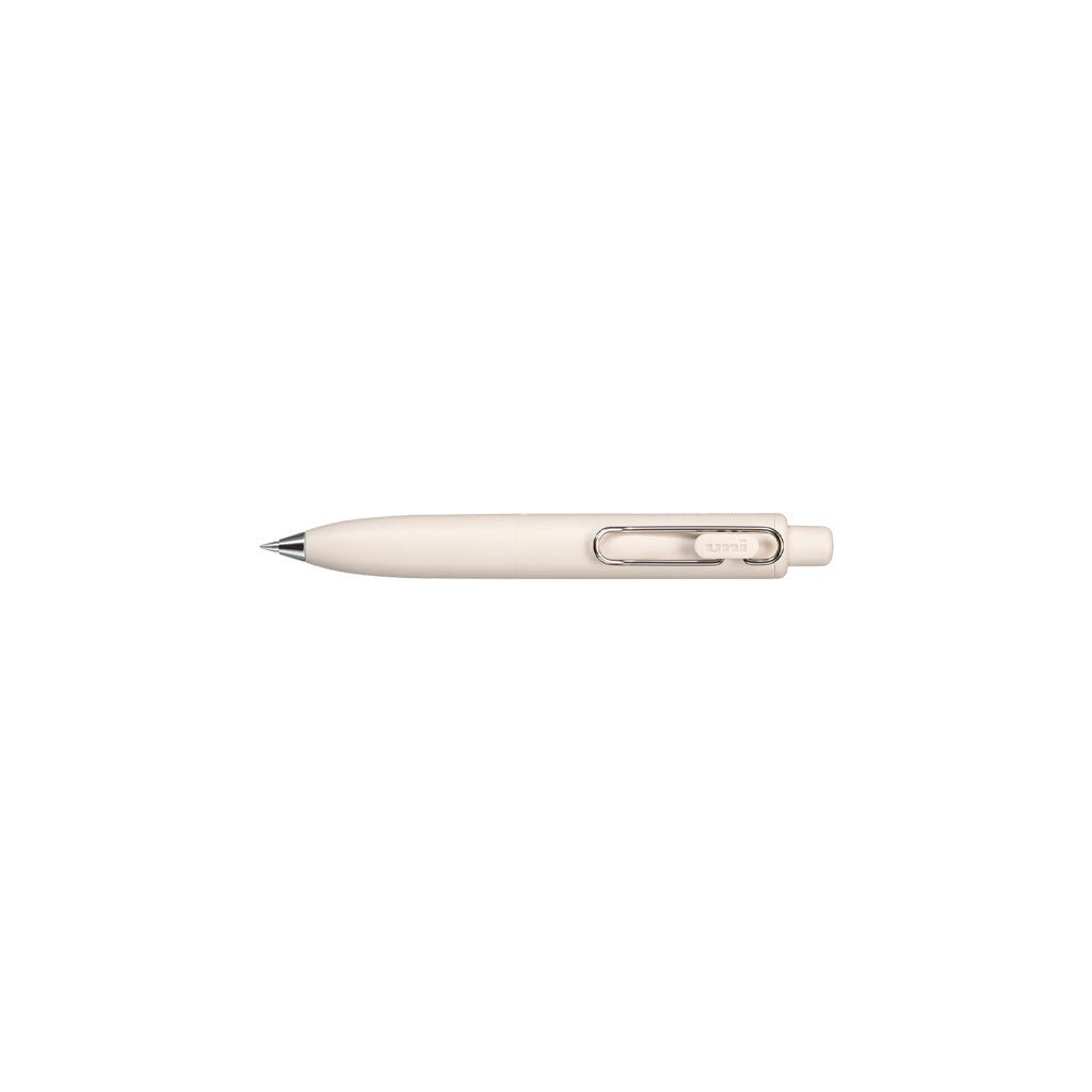 White uniball one p gel pen with wire pen clip on white background